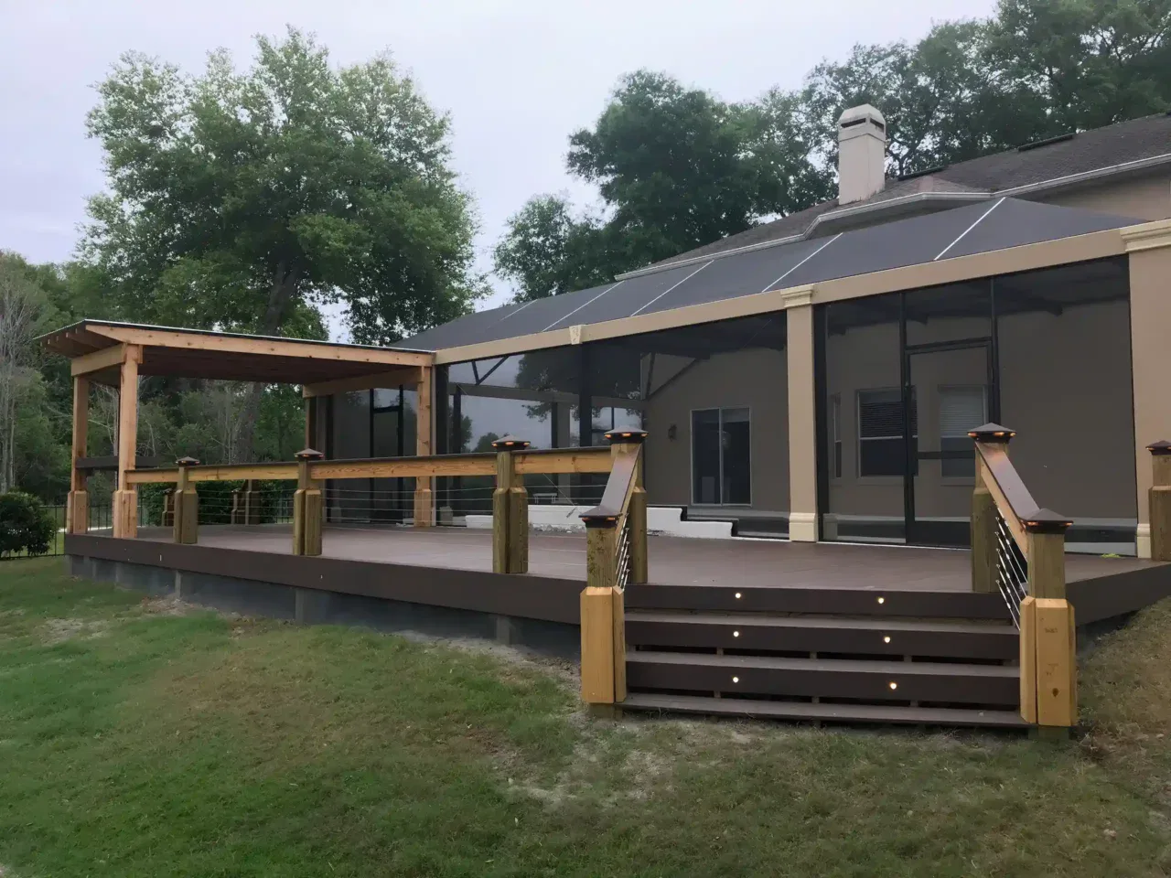 Photo of a covered deck with composite decking to support a story about TimberTech vs Trex, which is right for your Orlando home.