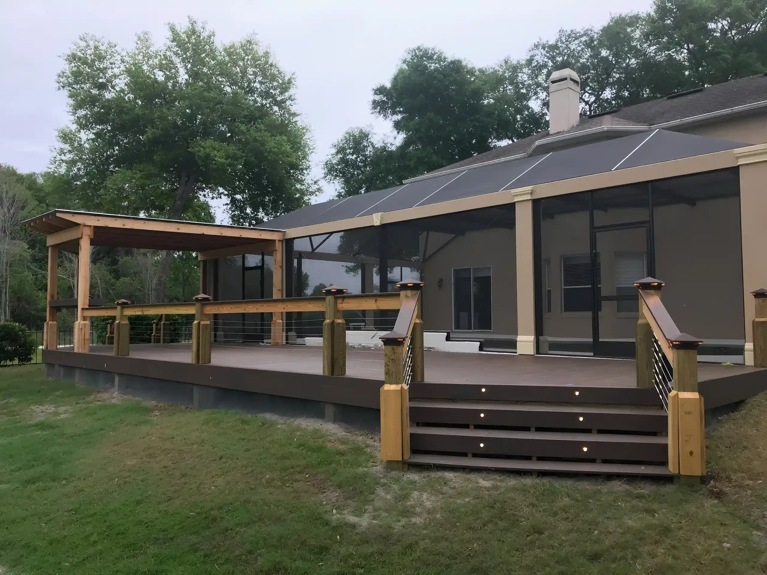 Photo of a covered deck with composite decking to support a story about TimberTech vs Trex, which is right for your Orlando home.