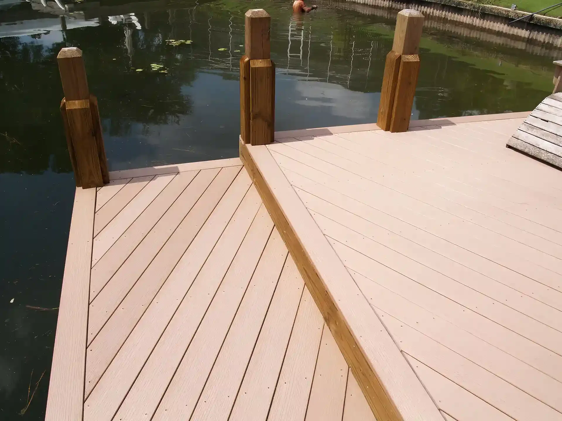 Photo of a boat dock with angled composite decking