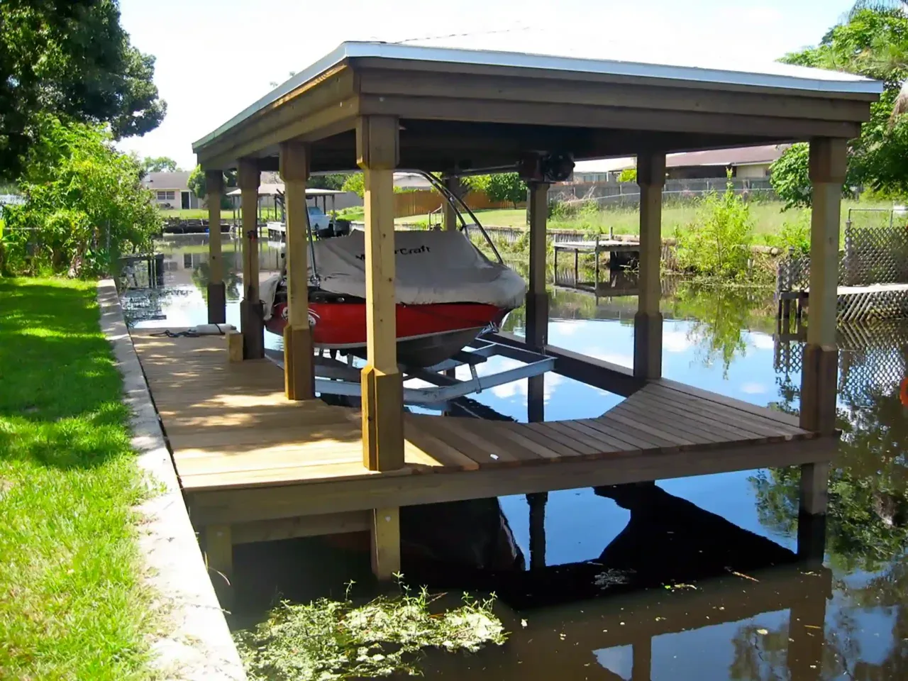 photo of a boat dock and boathouse on a Florida canal