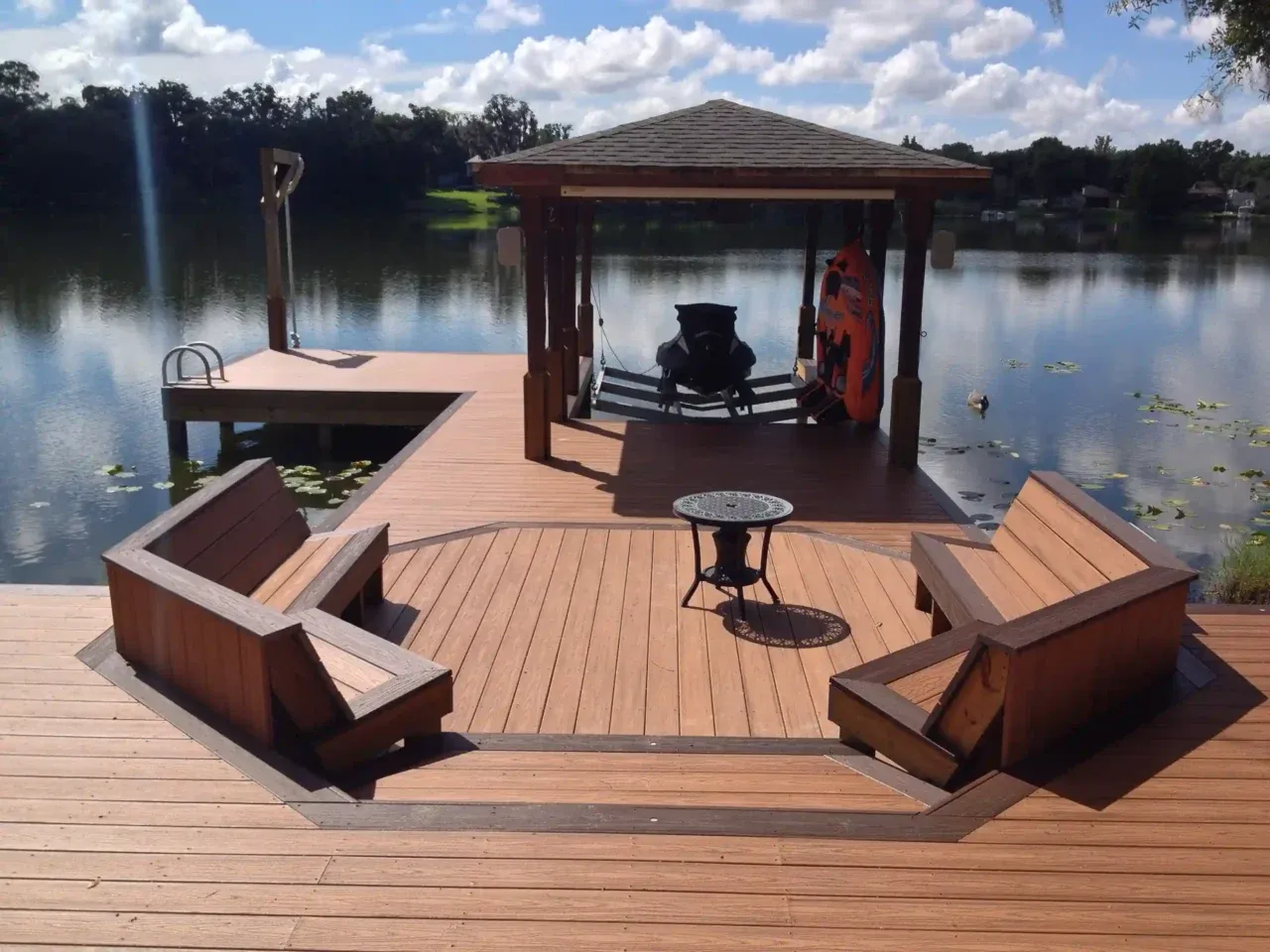Photo of a custom deck and dock by Summertime Deck & Dock, a deck builder in Central Florida.