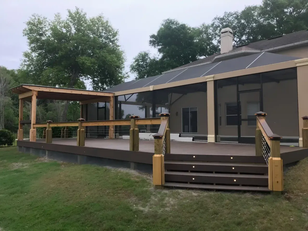 Photo of a covered deck with composite decking to support a story about TimberTech vs Trex, which is right for your Orlando home.