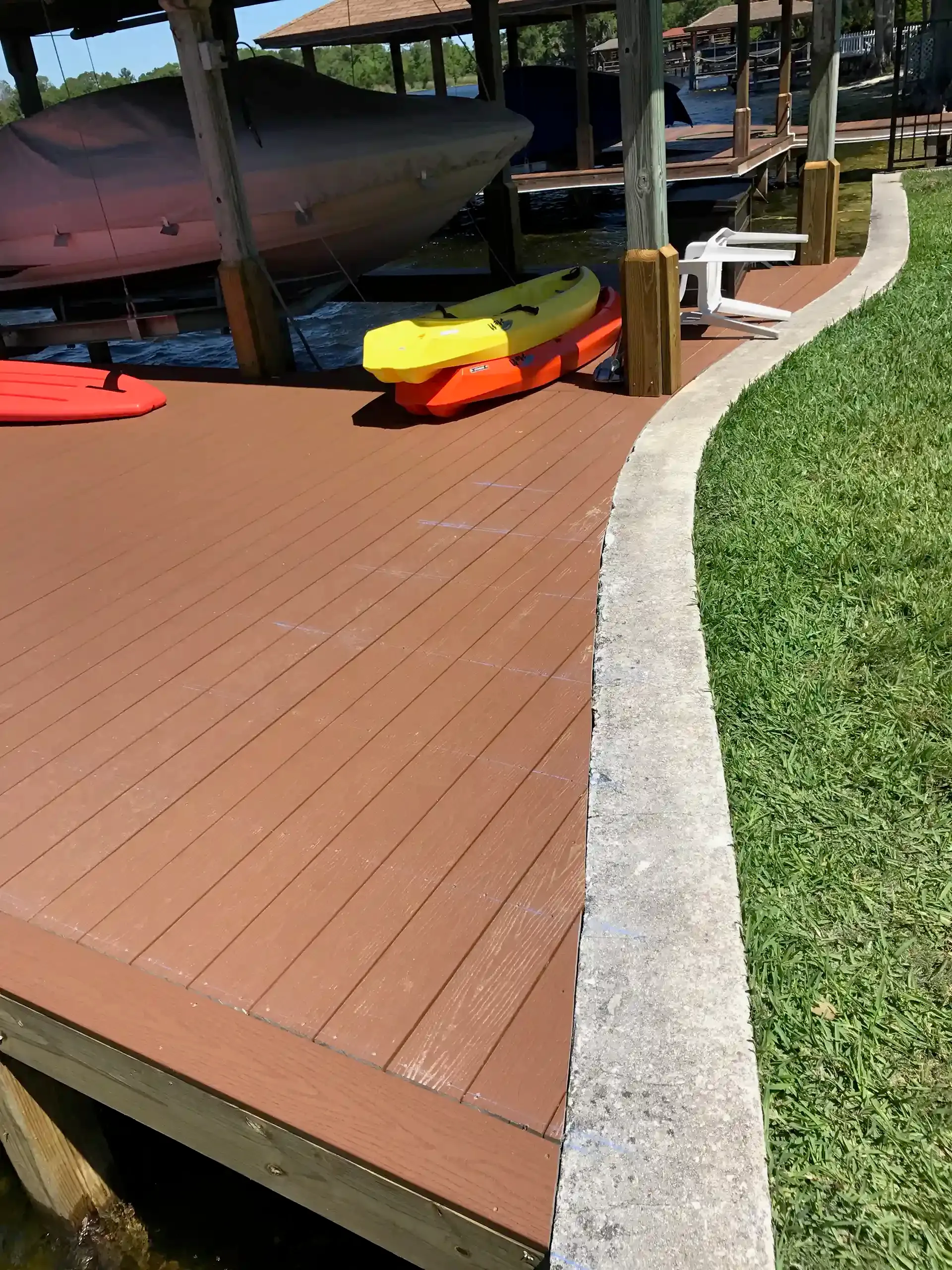 Photo of curved decking on a boat dock by Summertime Deck & Dock, a dock and deck builder in Orlando.