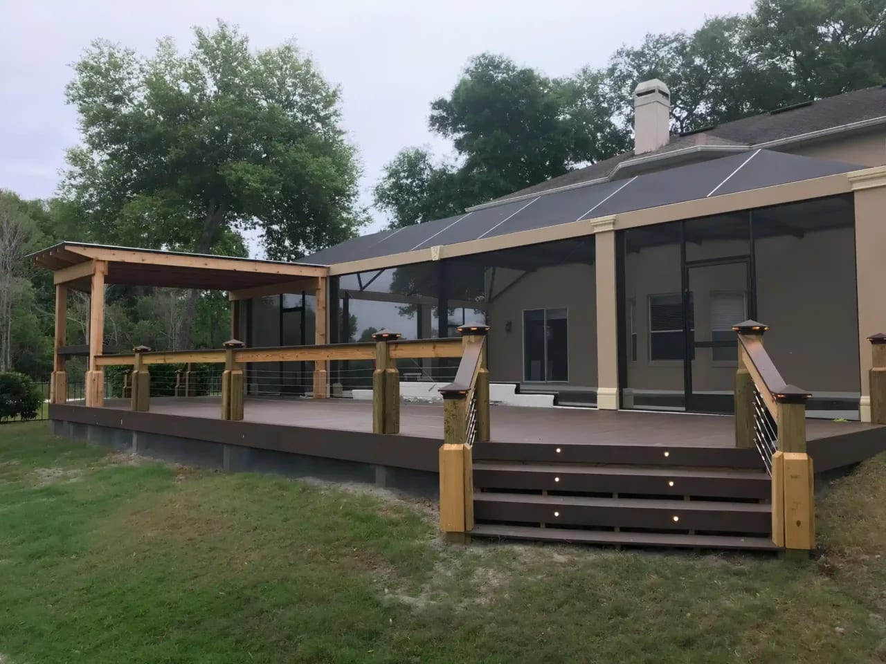 Photo of a covered deck with composite decking to support a story about TimberTech vs Trex, which is right for your Orlando home.